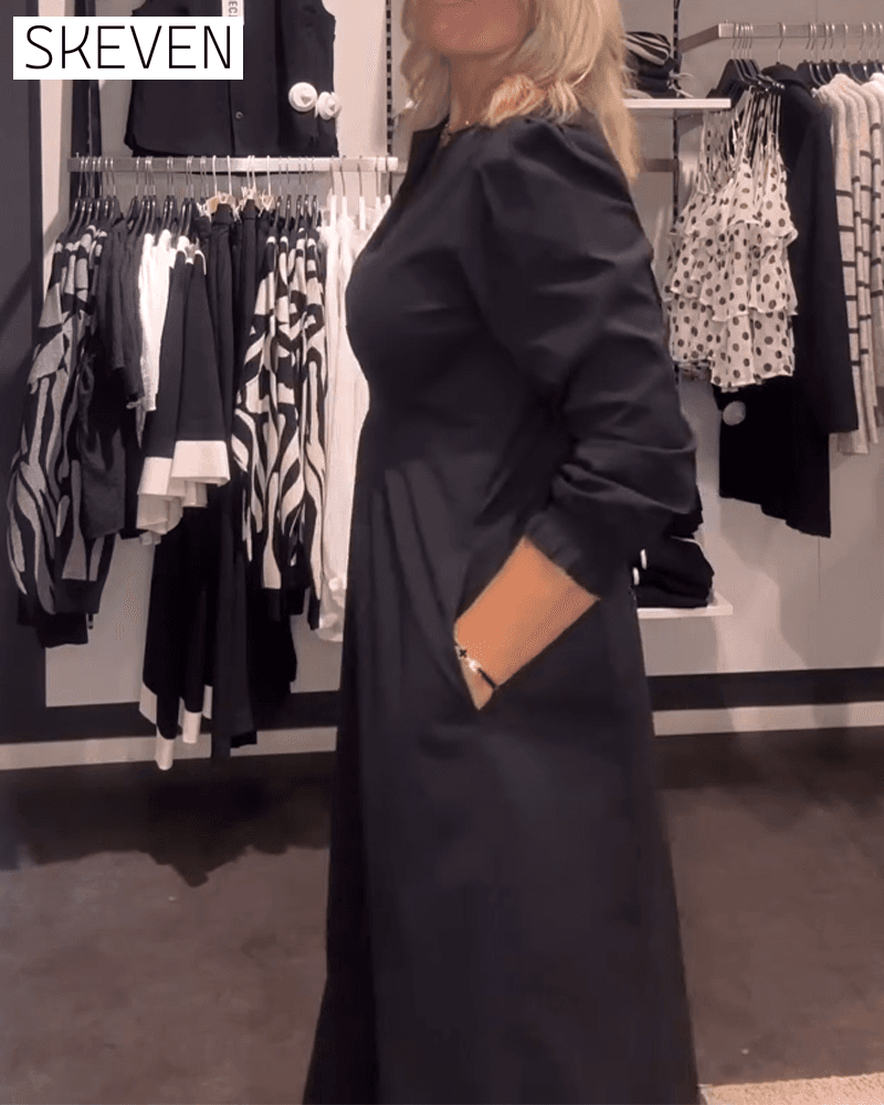 Robe trapèze à manches bouffantes et taille haute