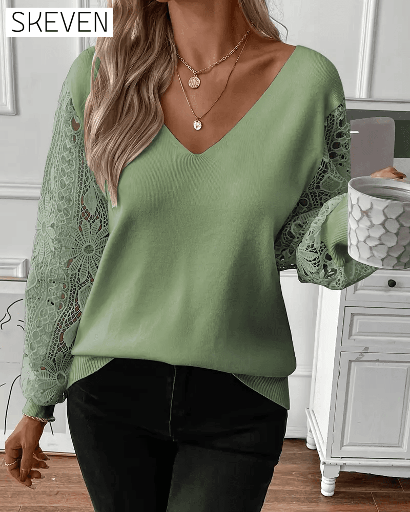 Modischer Pullover mit V-Ausschnitt und Lochmuster