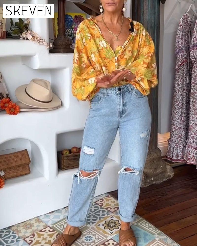 Bluse mit V-Ausschnitt und Blumenmuster