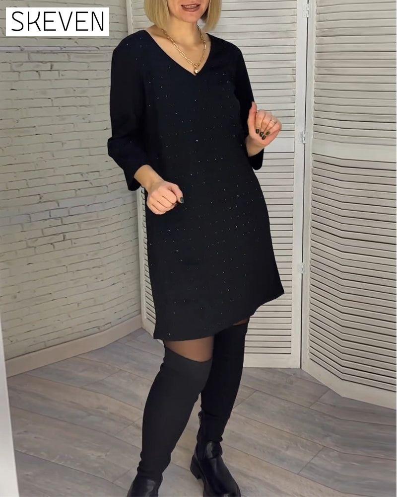 Robe élégante à col en V et manches trois-quarts