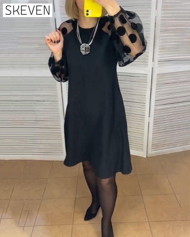Elegantes Kleid mit Polka-Dot-Muster