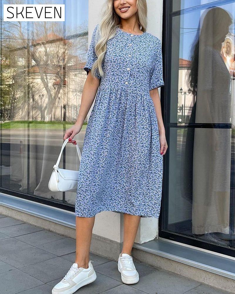 Blumenkleid mit halblangen Ärmeln und Knöpfen