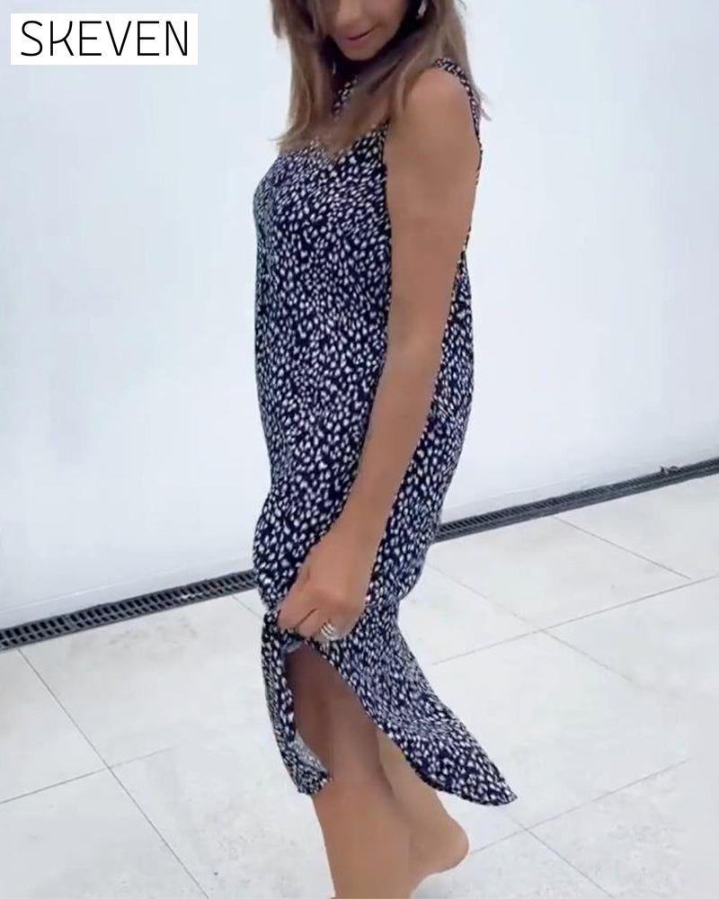 Bedrucktes, ärmelloses Kleid mit V-Ausschnitt