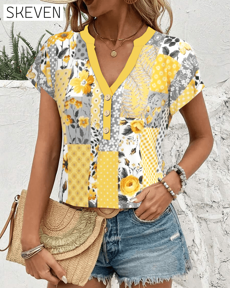 Bluse mit V-Ausschnitt und kurzen Ärmeln und Blumenmuster