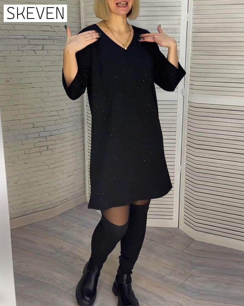 Robe élégante à col en V et manches trois-quarts
