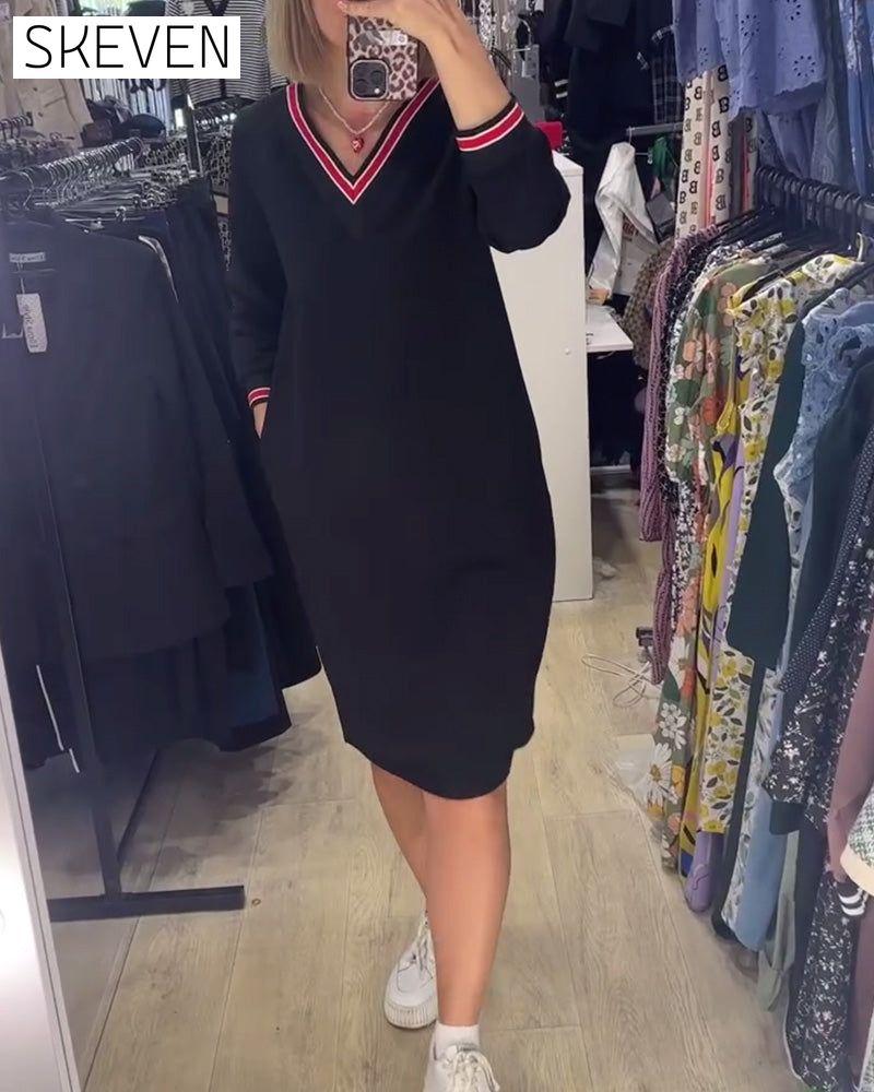 Robe élégante à col en V avec poches