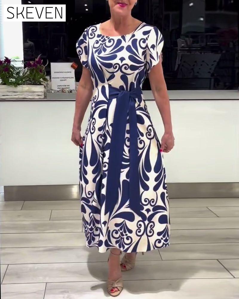 Elegantes Kurzarmkleid mit Kontrastprint