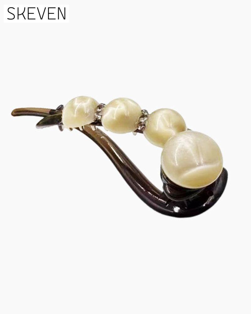 Elegante Haarspange für nach hinten gekämmte Frisuren