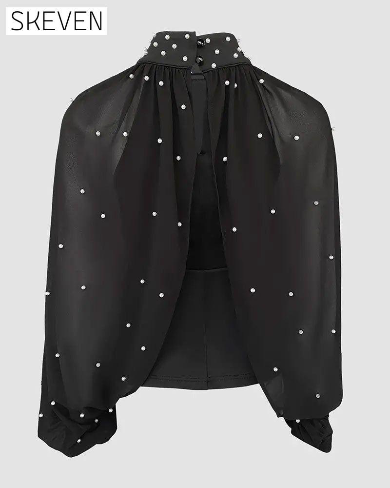 Elegantes Oberteil mit Laternenärmeln
