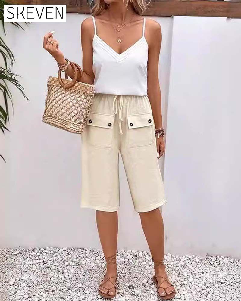 Casual solid color pocket half length trousers