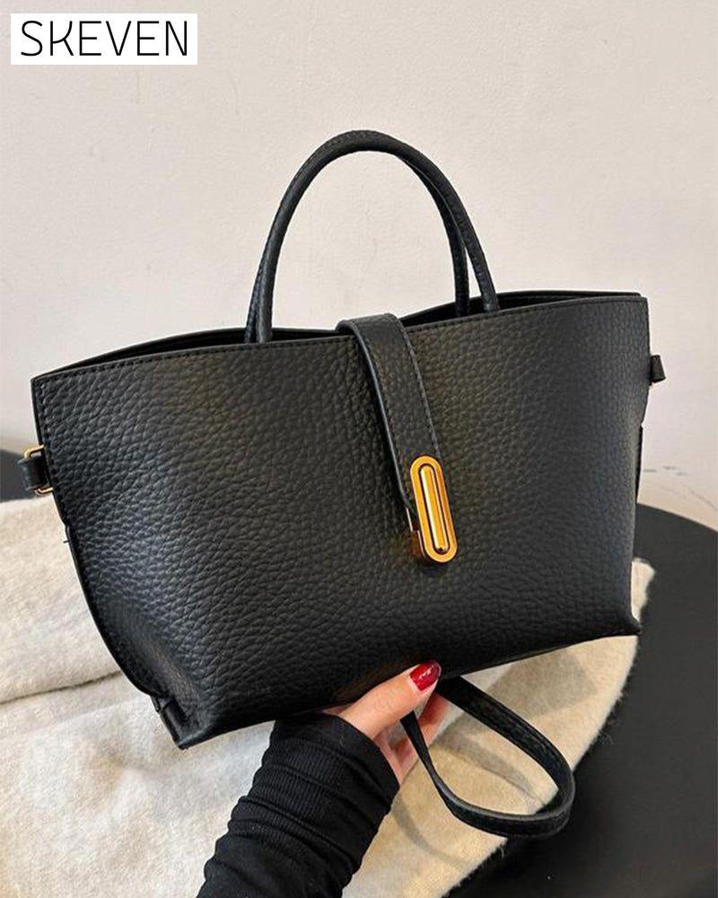 Elegante, einfarbige Damenhandtasche im französischen Stil