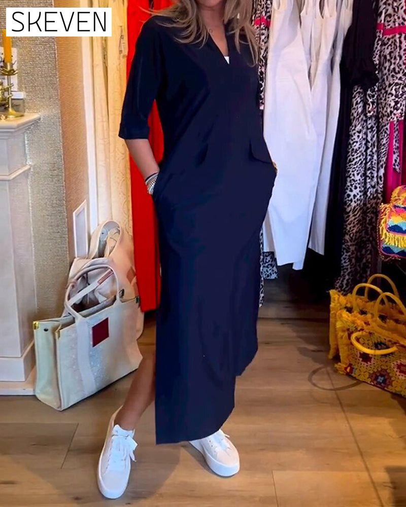 Kleid mit V-Ausschnitt und Taschen