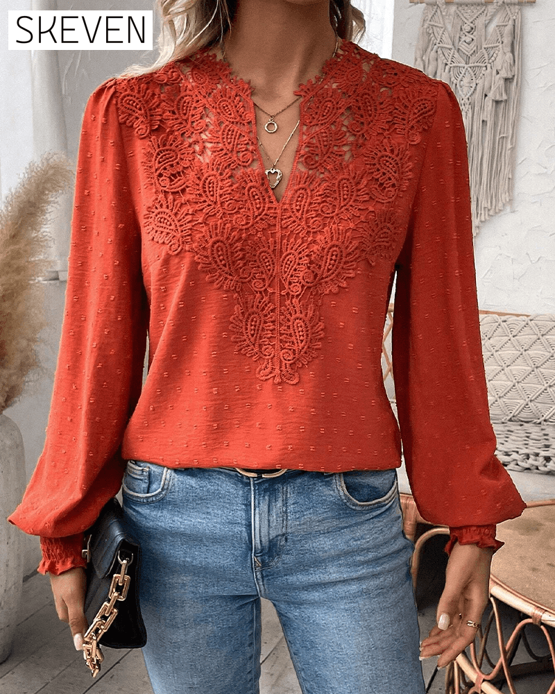 Bluse mit V-Ausschnitt und Jacquard-Spitze