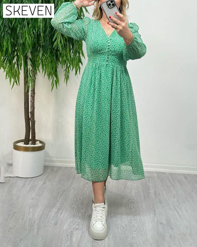 Elegantes Kleid mit Print und Knöpfen