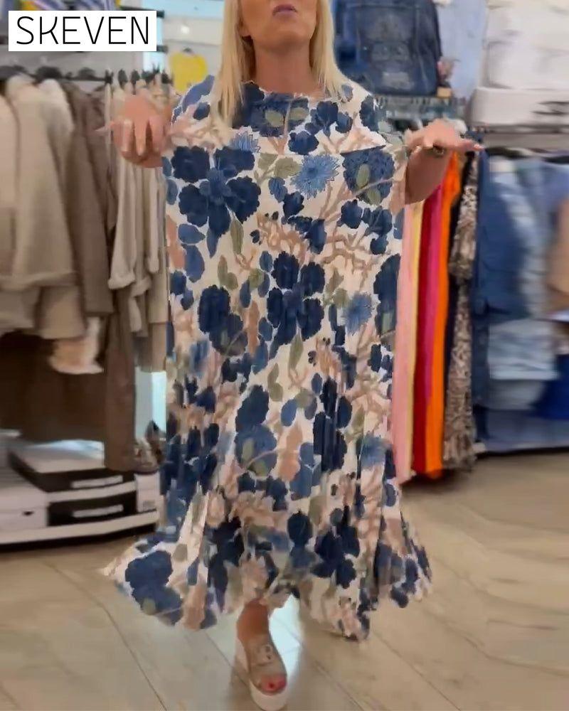 Elegantes Kleid mit Rundhalsausschnitt und Blumenmuster