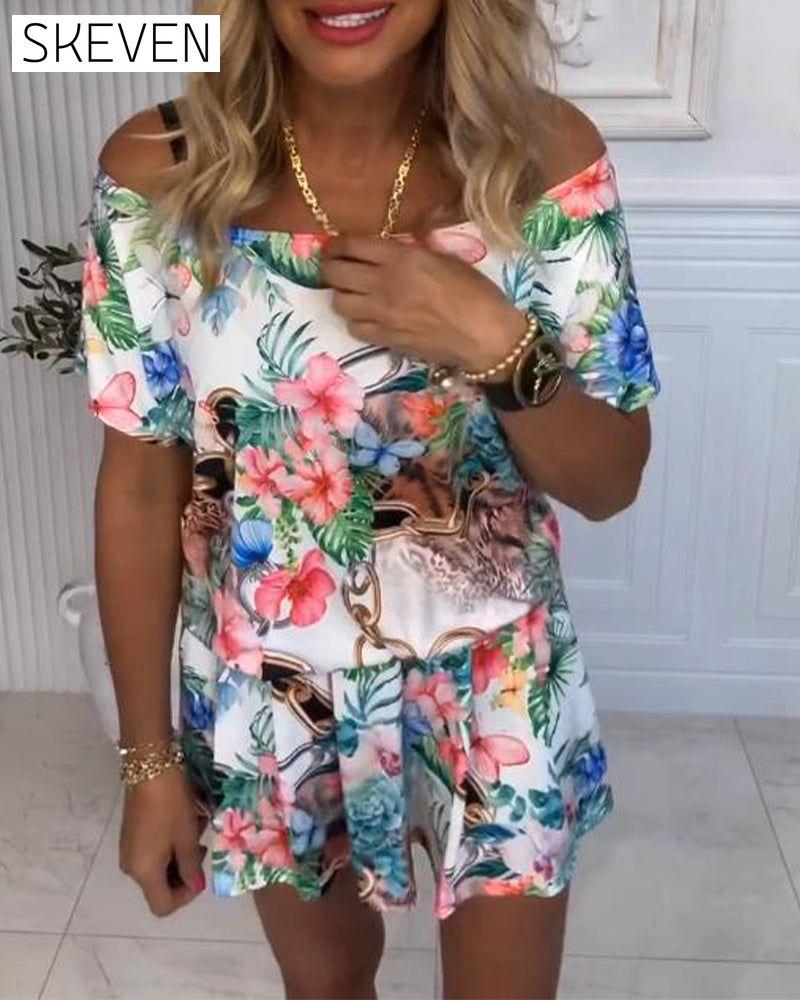 Jumpsuit mit Pflanzen- und Blumenmuster und schulterfreiem Ausschnitt