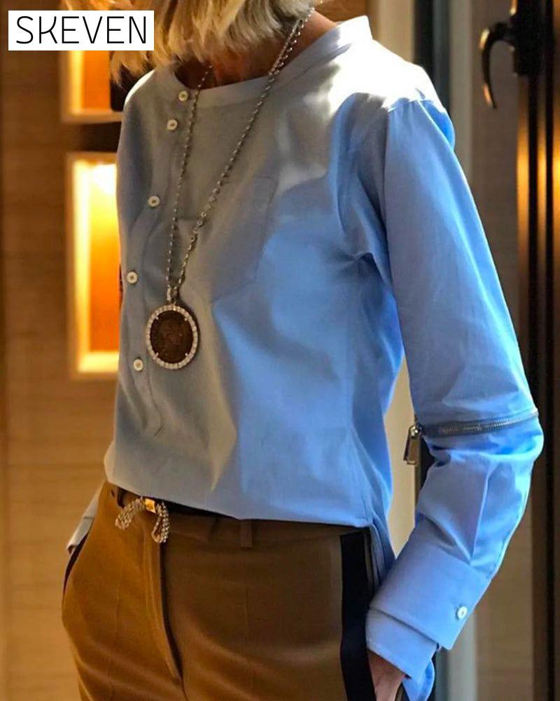 Buttoned solid color irregular top