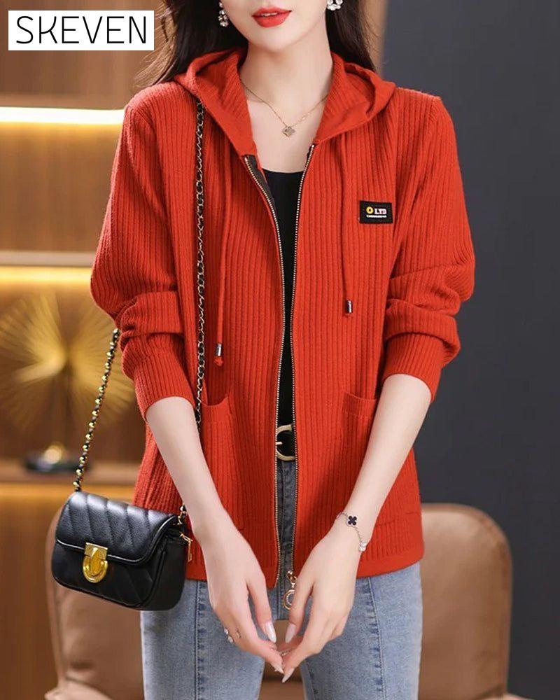 Jacket With Hooded Zipper Closure