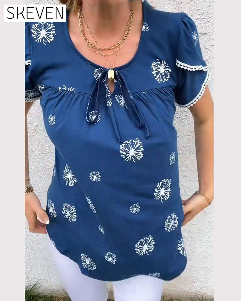 Bluse mit Blütenblattärmeln und Batikmuster
