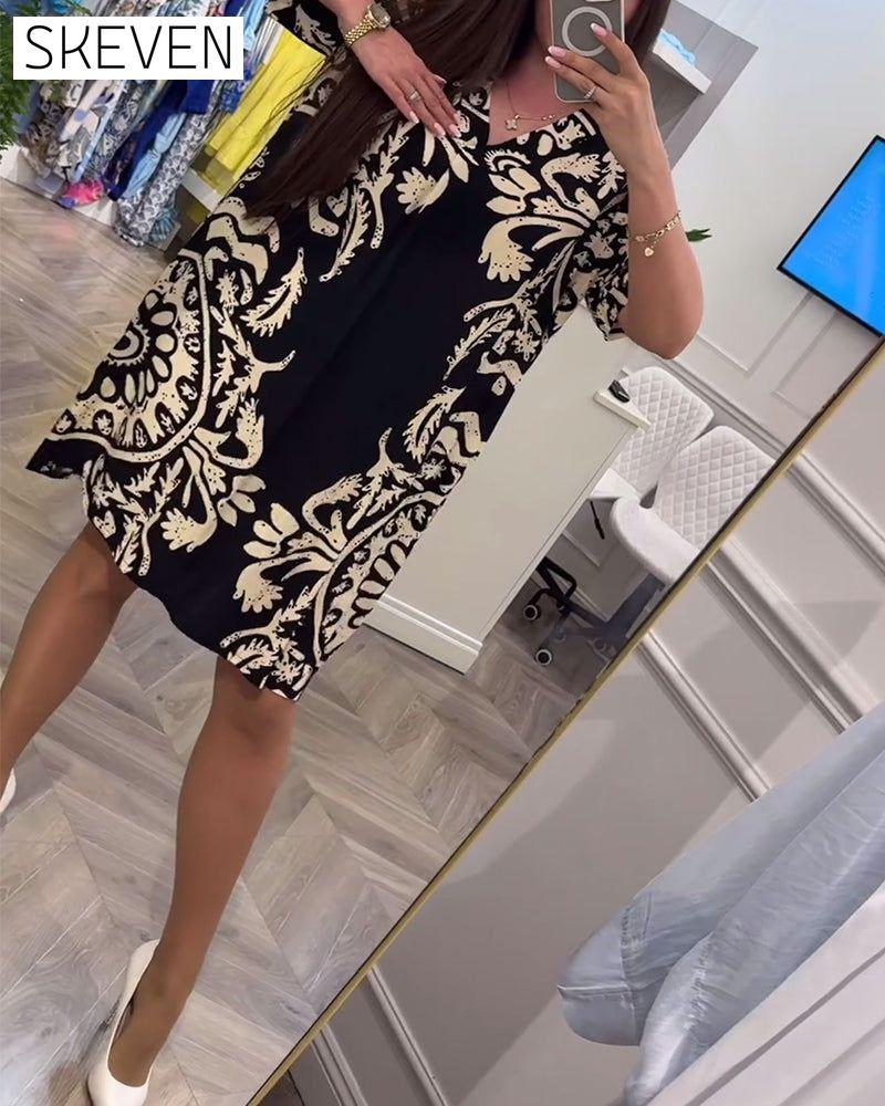 Robe ample rétro imprimée à col en V et manches courtes