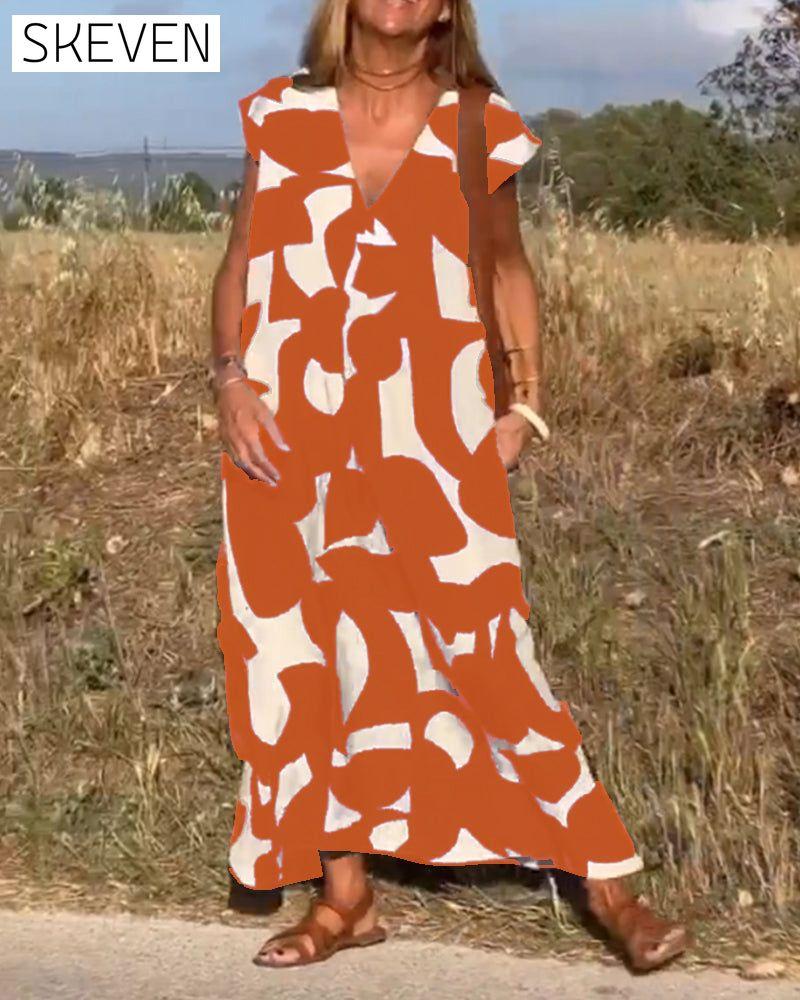 bedrucktes Kleid mit V-Ausschnitt