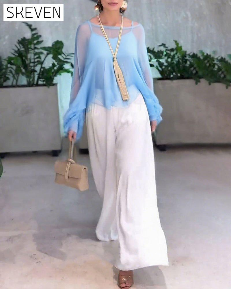 Modische Bluse in Unifarben mit schwungvollem Design
