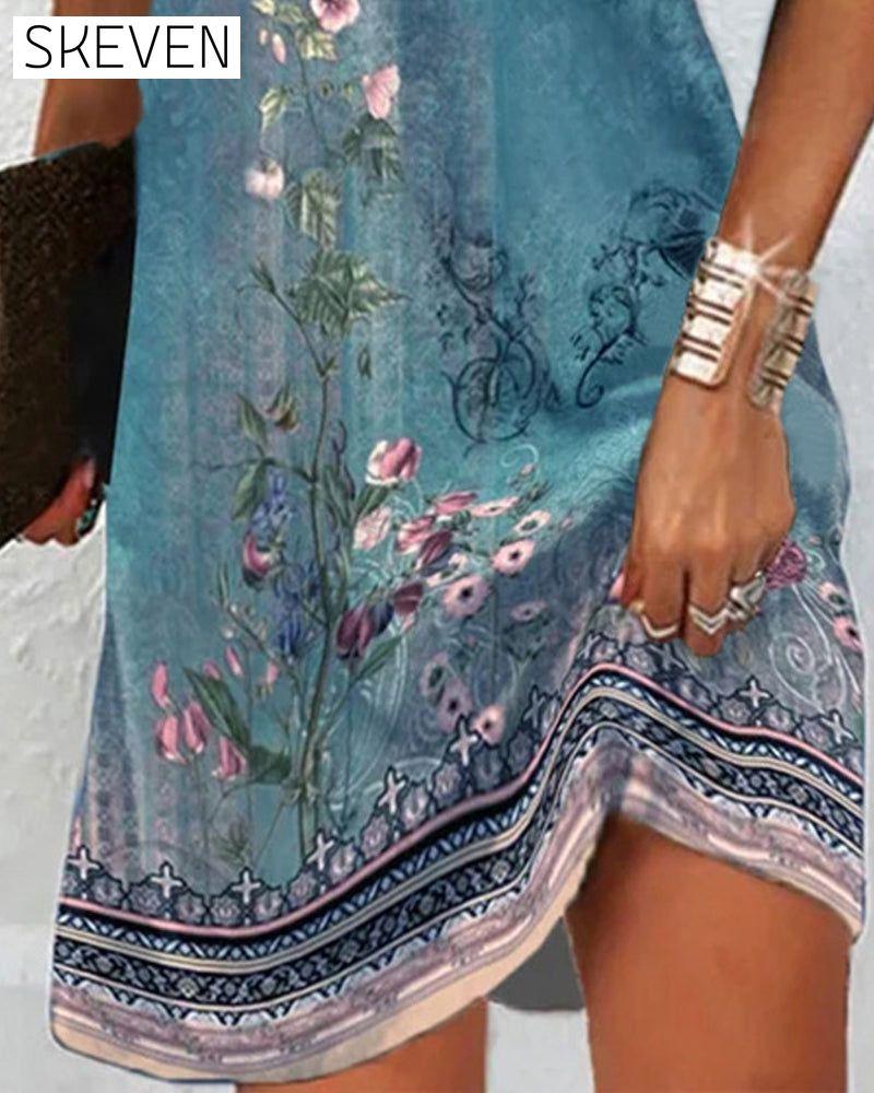 Kleid mit Blumenmuster und kurzen Ärmeln
