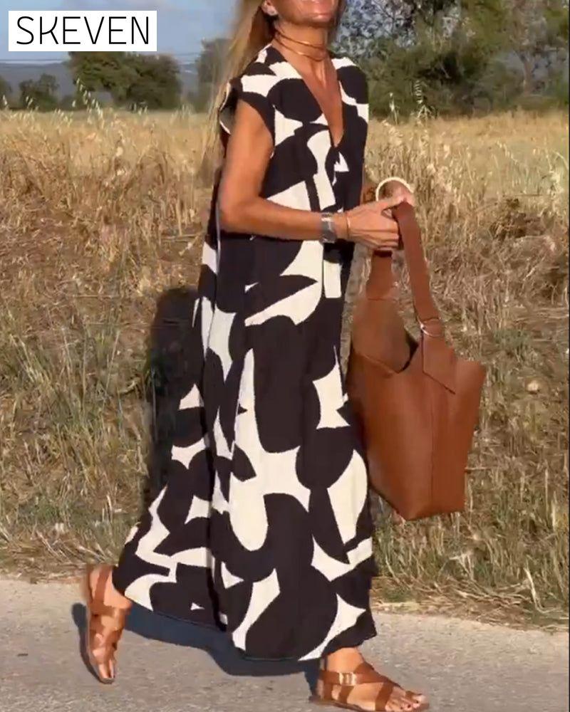 bedrucktes Kleid mit V-Ausschnitt