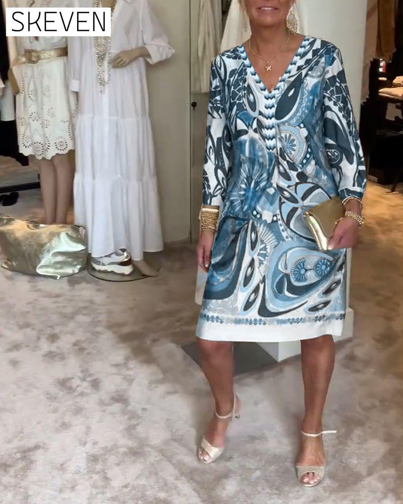 Lässiges Kleid mit Retro-Print und V-Ausschnitt