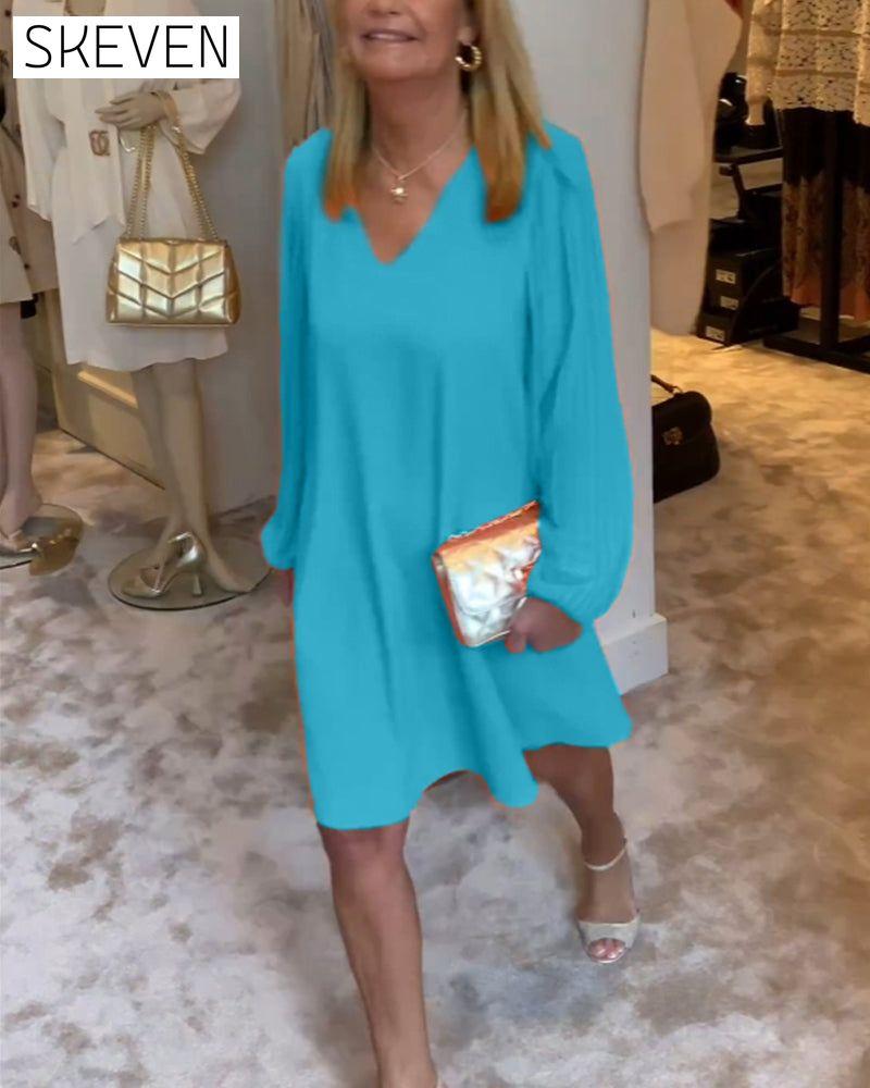 einfarbiges Kleid mit Laternenärmeln und V-Ausschnitt