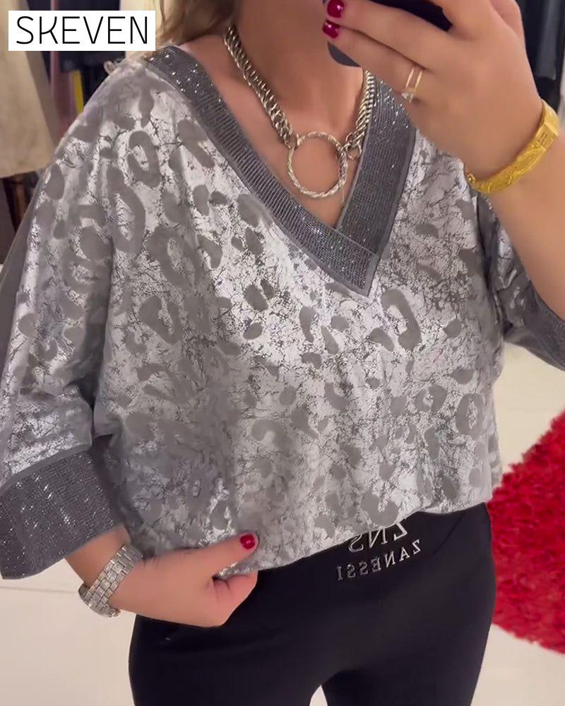 Lässige Bluse mit V-Ausschnitt und Print