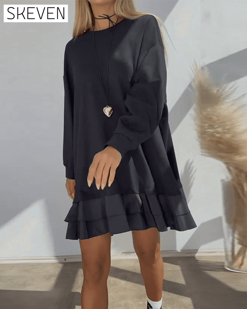 Locker geschnittenes, einfarbiges Kleid mit Patchwork