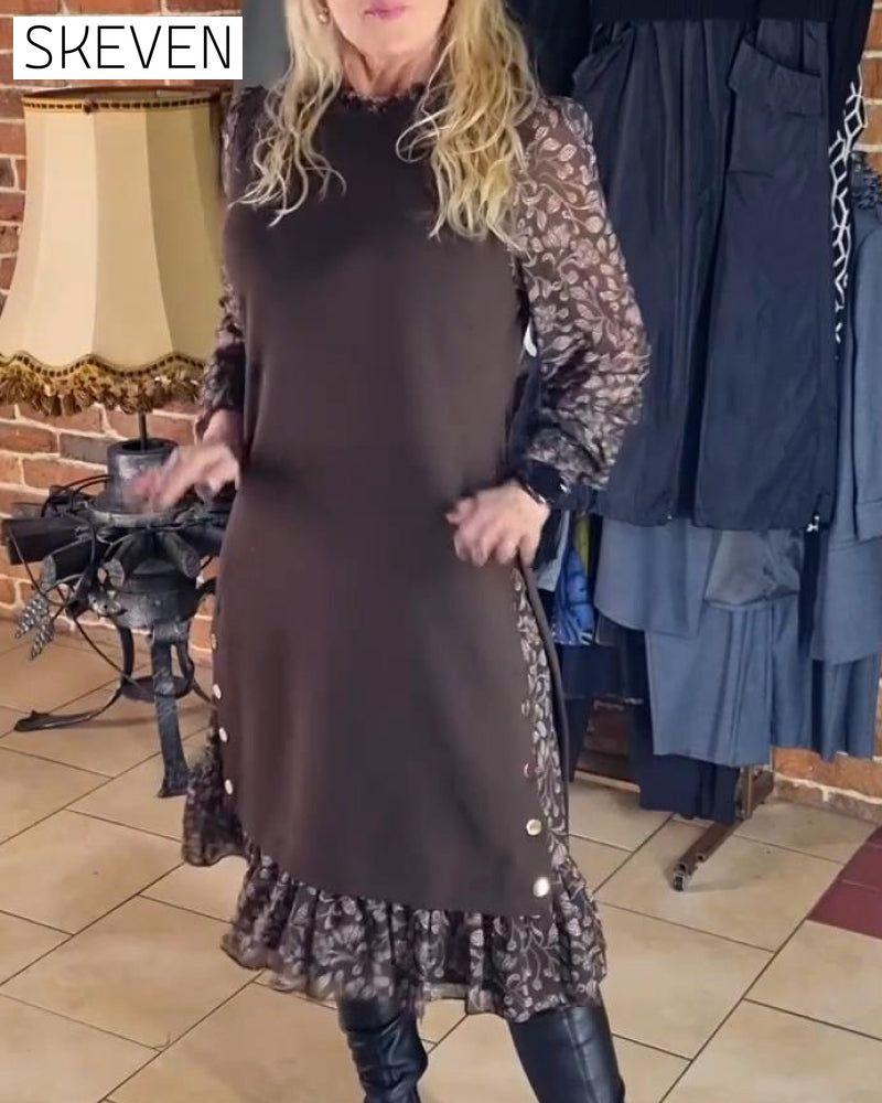Kleid mit Rundhalsausschnitt und angedeutetem Zweiteiler