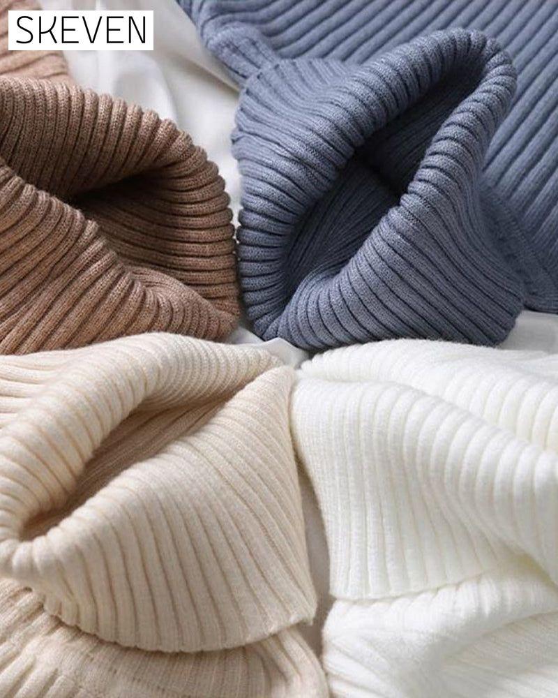 Hochgeschlossener Strickpullover als Basisschicht