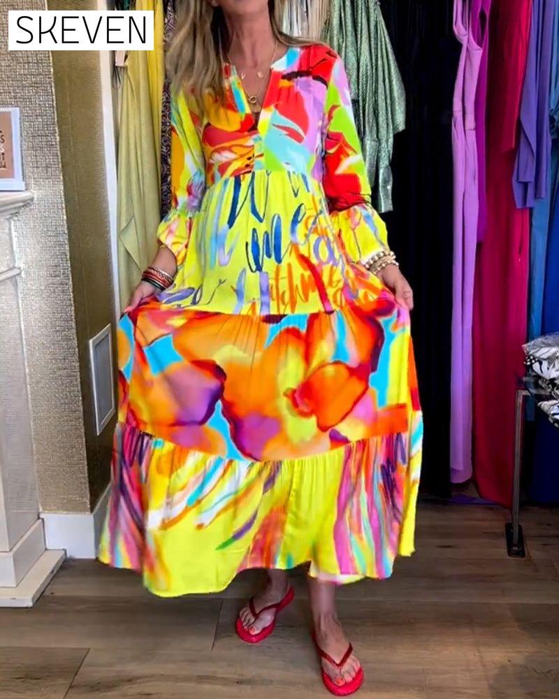 Bedrucktes Kleid mit ausgestellten Ärmeln