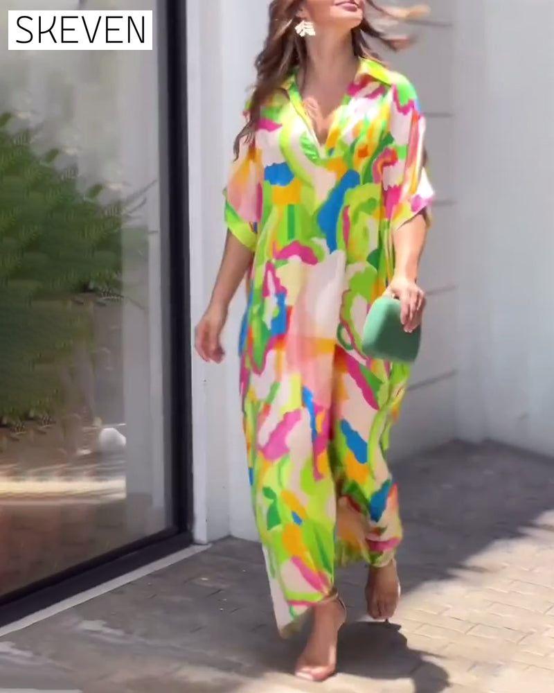 Bedrucktes, lässiges Kleid mit halblangen Ärmeln und Reverskragen