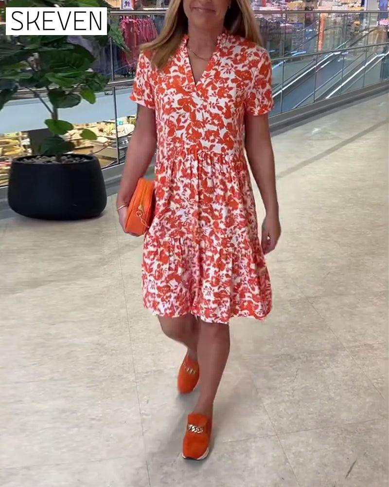 Kurzärmeliges geblümtes Midikleid