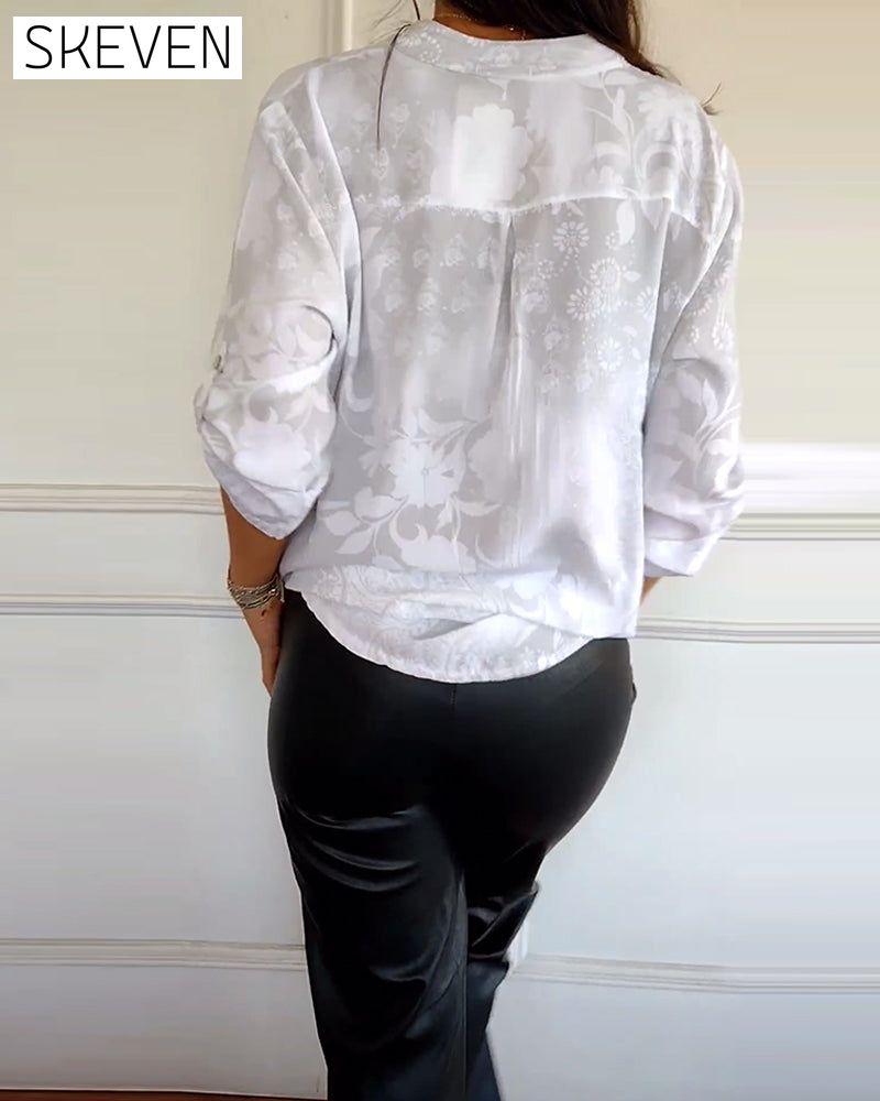 Elegantes Oberteil in Unifarbe mit Knopftasche