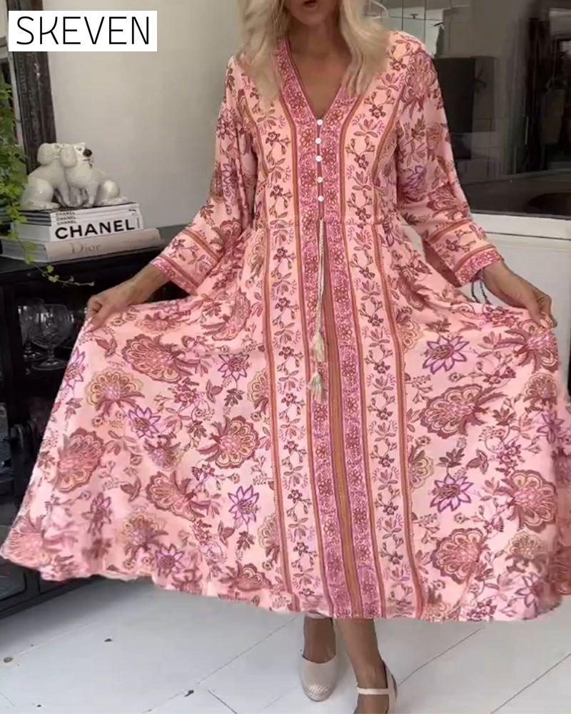 Elegantes bedrucktes Kleid mit V-Ausschnitt, Knopfleiste und Kordelzug