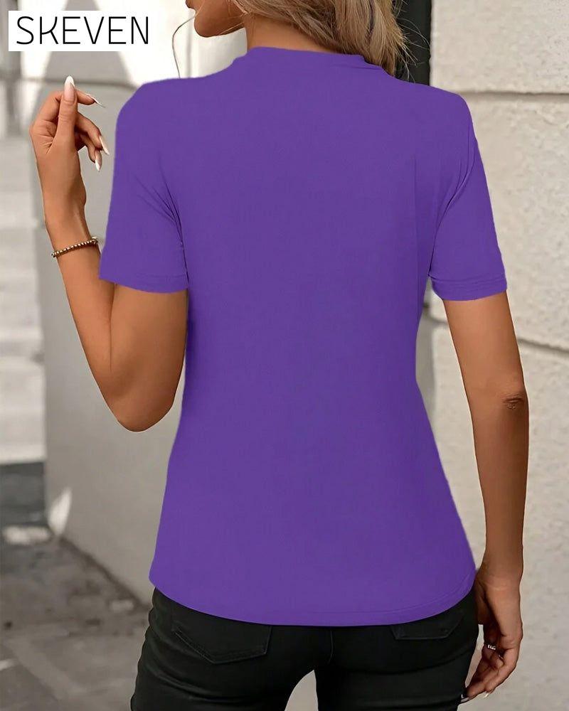 T-shirt à col rond, couleur unie, coupe ajustée