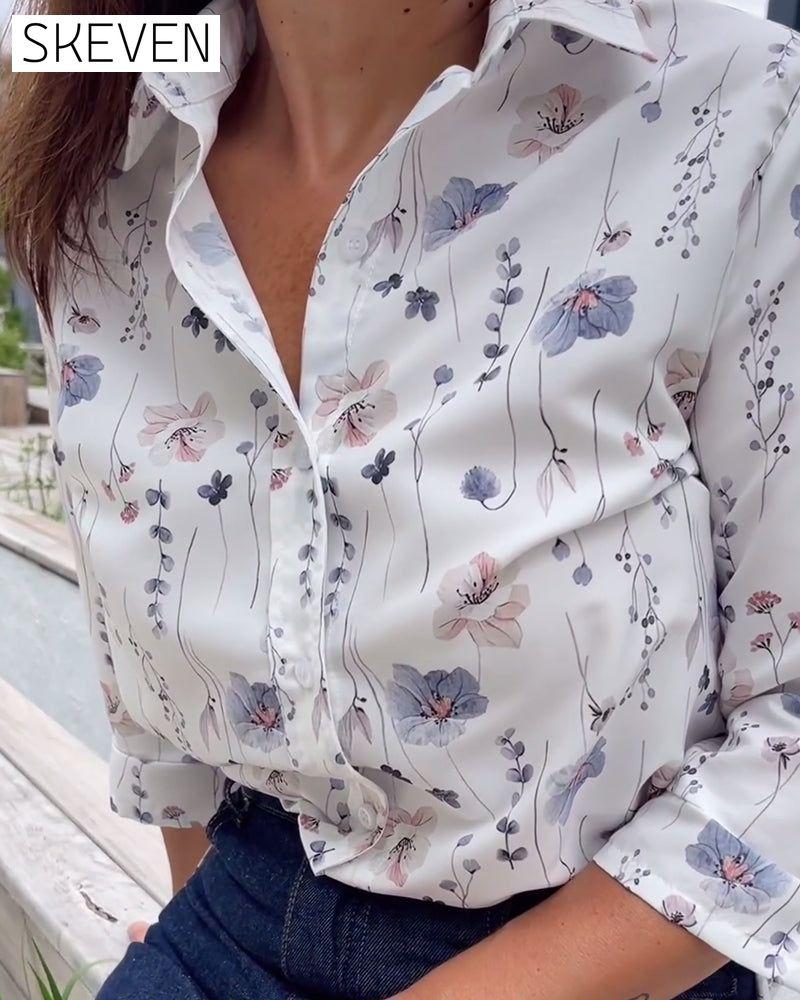 Elegantes Hemd mit floralem Muster, Reverskragen und Dreiviertelärmeln
