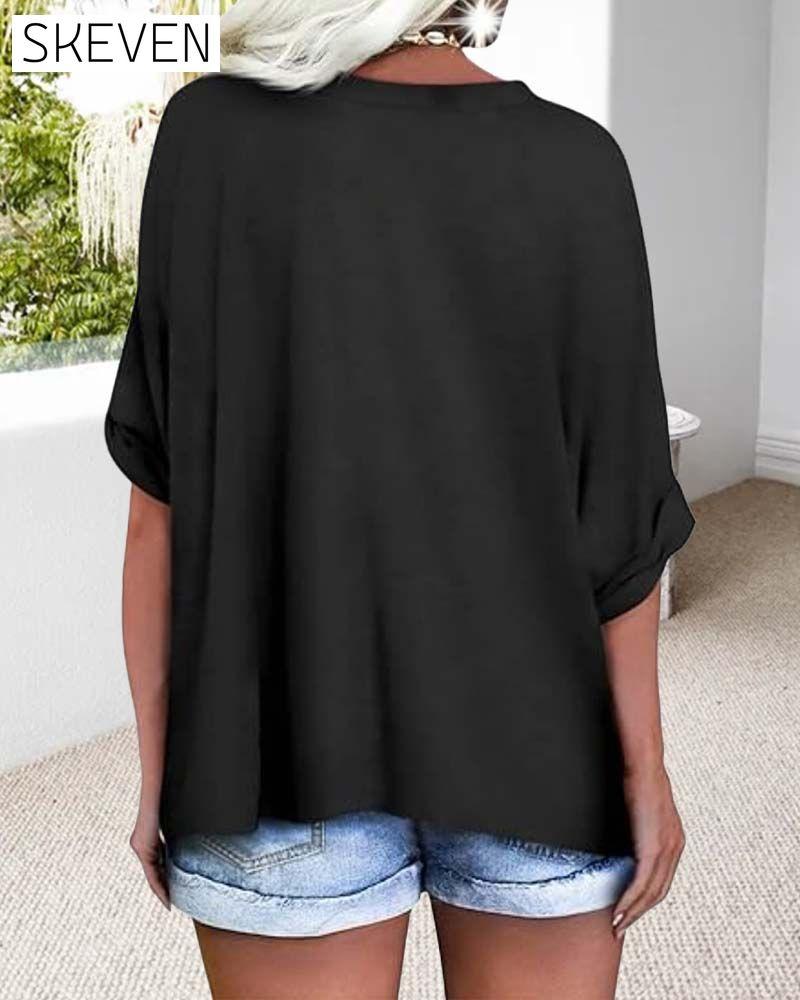 T-shirt ample à manches courtes et col en V et ourlet roulé