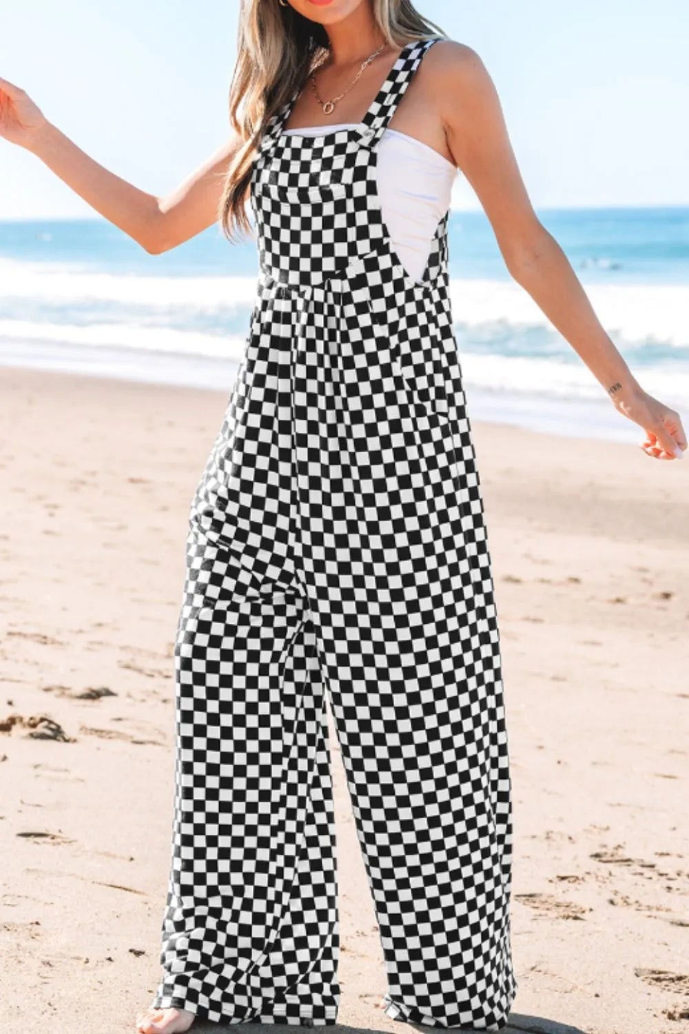Jumpsuit mit Karomuster, Taschen und weitem Bein