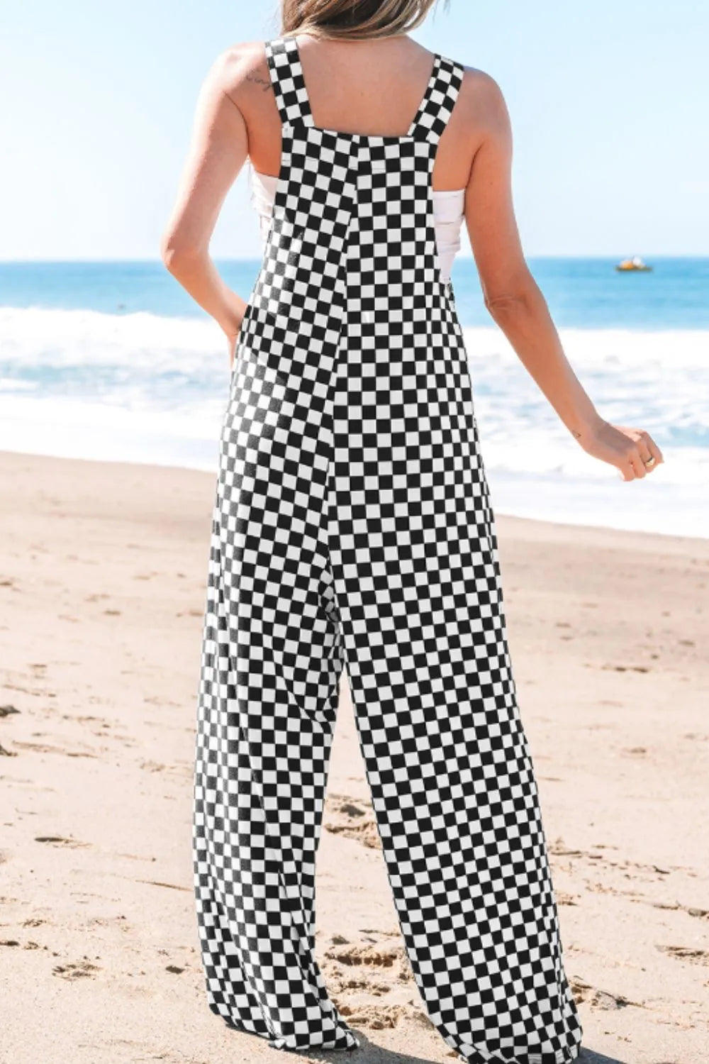 Jumpsuit mit Karomuster, Taschen und weitem Bein