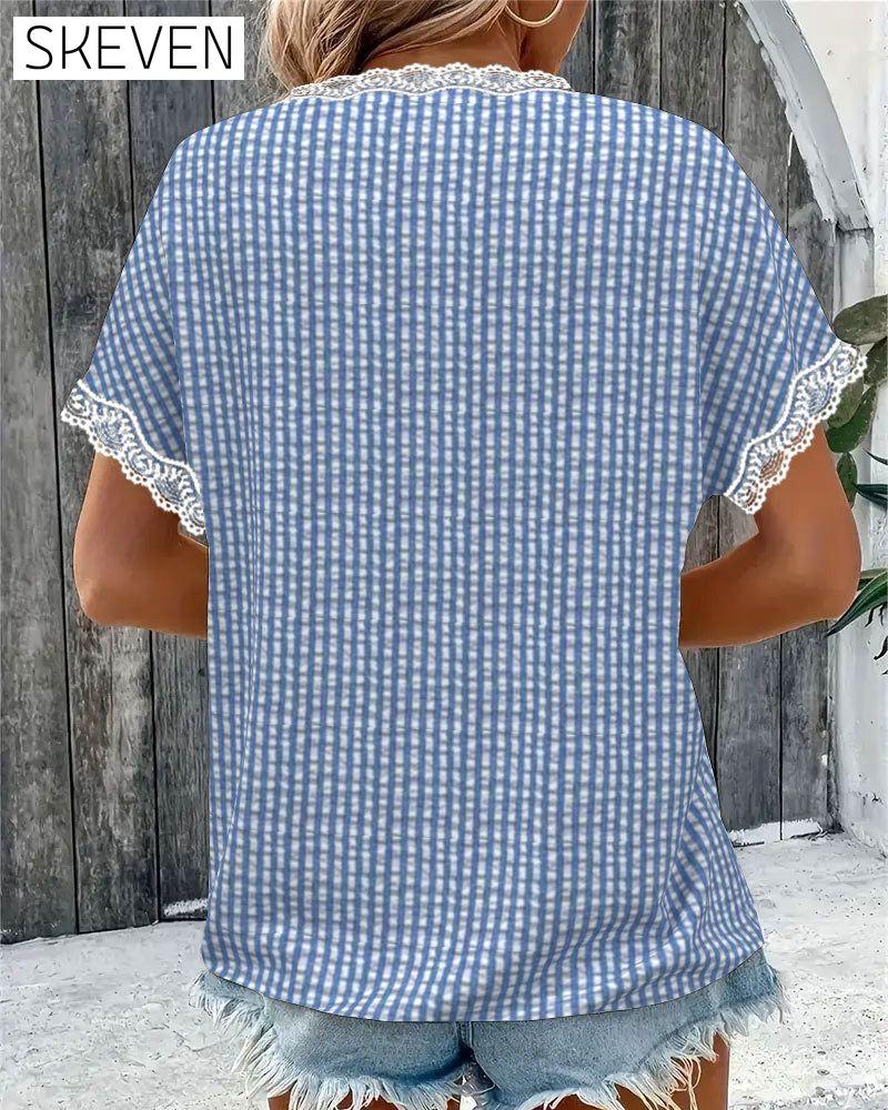 Blouse rayée à encolure ronde et empiècements en dentelle