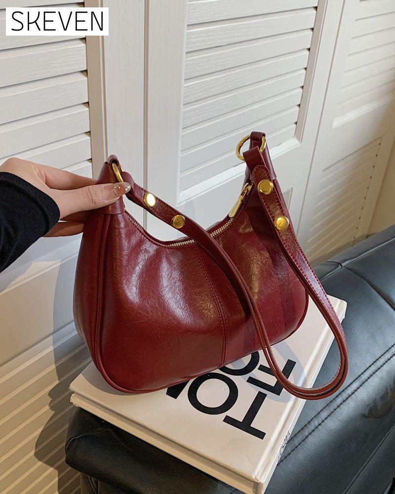 Achseltasche aus gewachstem Leder 
