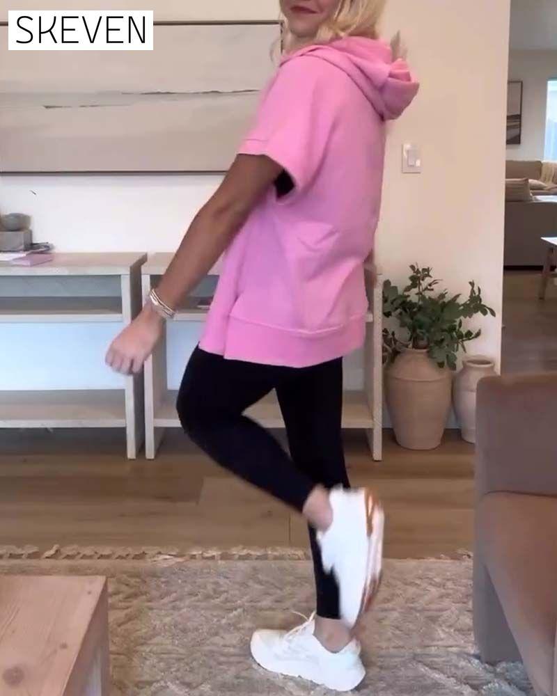 Sweat à capuche à manches courtes et poche demi-zip