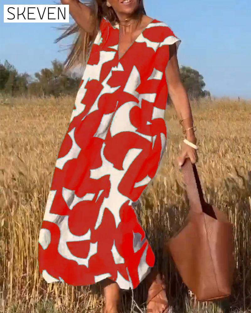 bedrucktes Kleid mit V-Ausschnitt