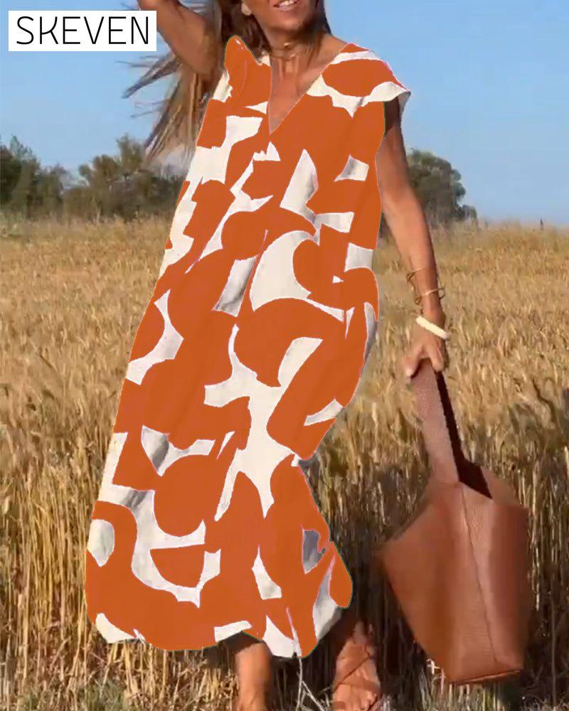 bedrucktes Kleid mit V-Ausschnitt