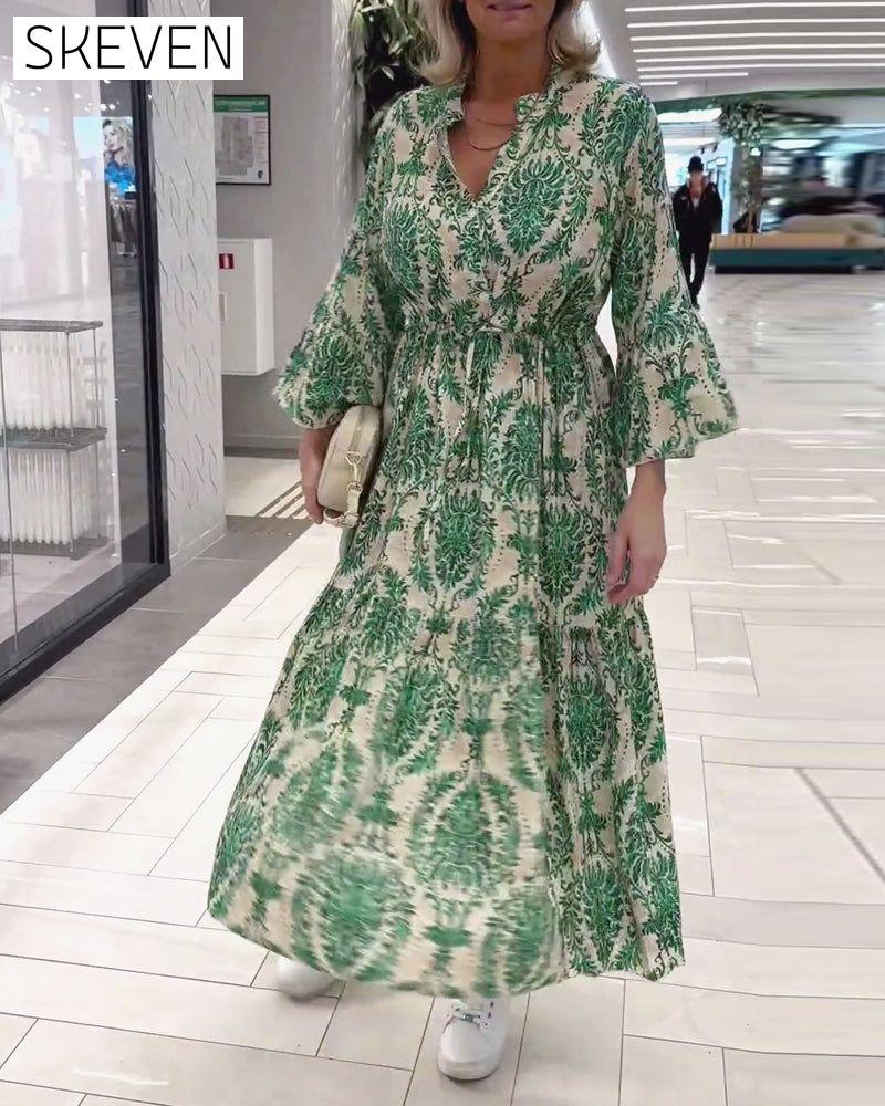 Bedrucktes Kleid mit Glockenärmeln und Kordelzug